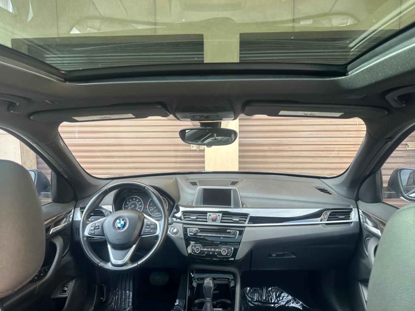 2016 Gray /Black BMW X1 leather (WBXHT3Z34G4) with an 4 CYLINDER engine, Automatic transmission, located at 30 S. Berkeley Avenue, Pasadena, CA, 91107, (626) 248-7567, 34.145447, -118.109398 - Crown City Motors is a used “Buy Here Pay Here” car dealer in Pasadena CA. “Buy Here Pay Here” financing, means that when you purchase your vehicle from our dealership, that you make the payments to the dealership as well. We do not need the banks approval to get you approved for a used auto - Photo#22